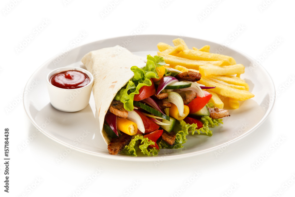 Tortilla wrap with french fries on white background Tortilla wrap with french fries on white background