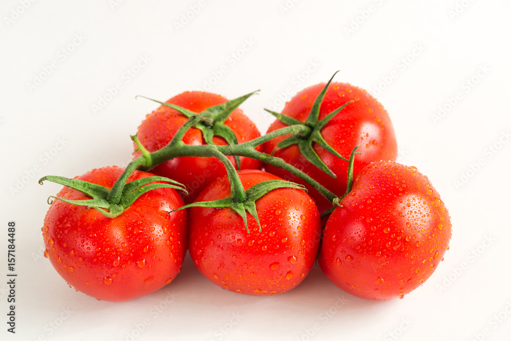 Red fresh tomatoes isolated on white background Red fresh tomatoes isolated on white background