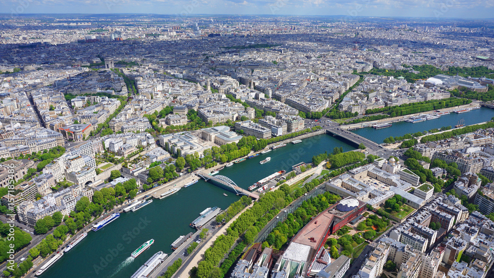 Aerial view of river Seine from Eiffel tower with beautiful scattered clouds, Paris, France