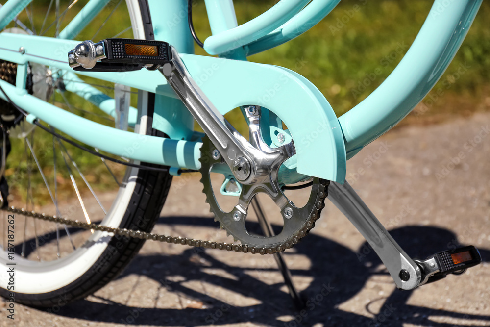 Bicycle crankarm and pedals on blurred background Bicycle crankarm and pedals on blurred background
