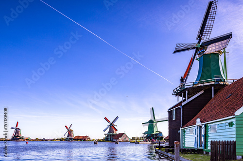 Zaanse Schans has a collection of well-preserved historic windmills and houses in the Netherlands established in 1994. Very popular tourist attractions in Holland.