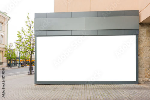 Fototapeta Naklejka Na Ścianę i Meble -  Mock up of big store blank showcase window in a city