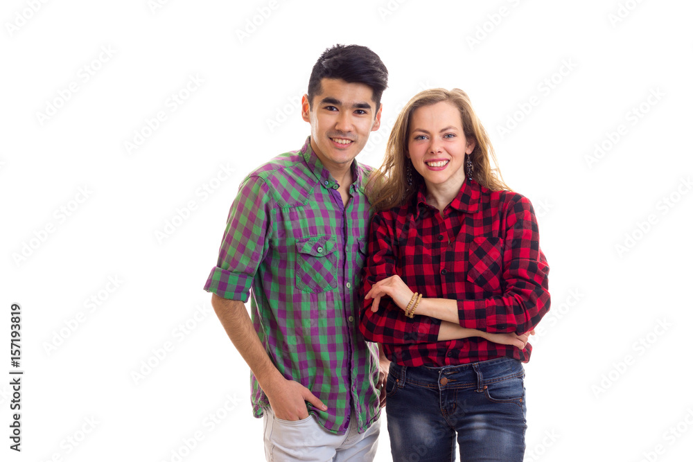 Young couple in plaid shirts Young couple in plaid shirts