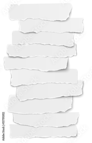 Set of elongated torn paper fragments placed one over another isolated on white background