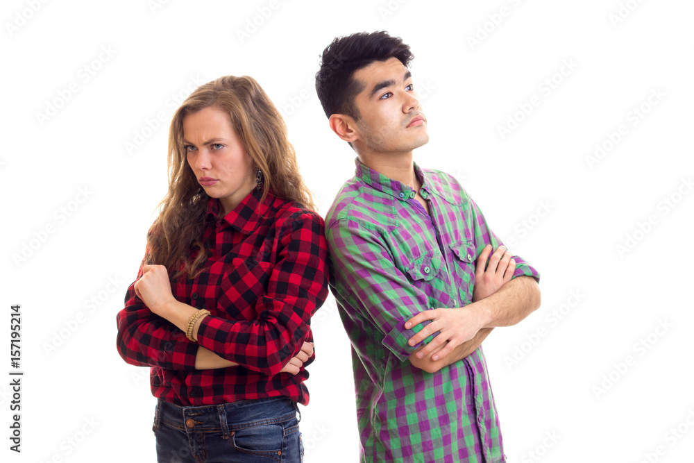 Young couple in plaid shirts Young couple in plaid shirts