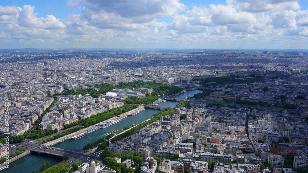 Aerial view of river Seine from Eiffel tower with beautiful scattered clouds, Paris, France