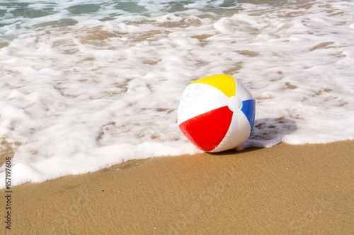 Beach ball on sand