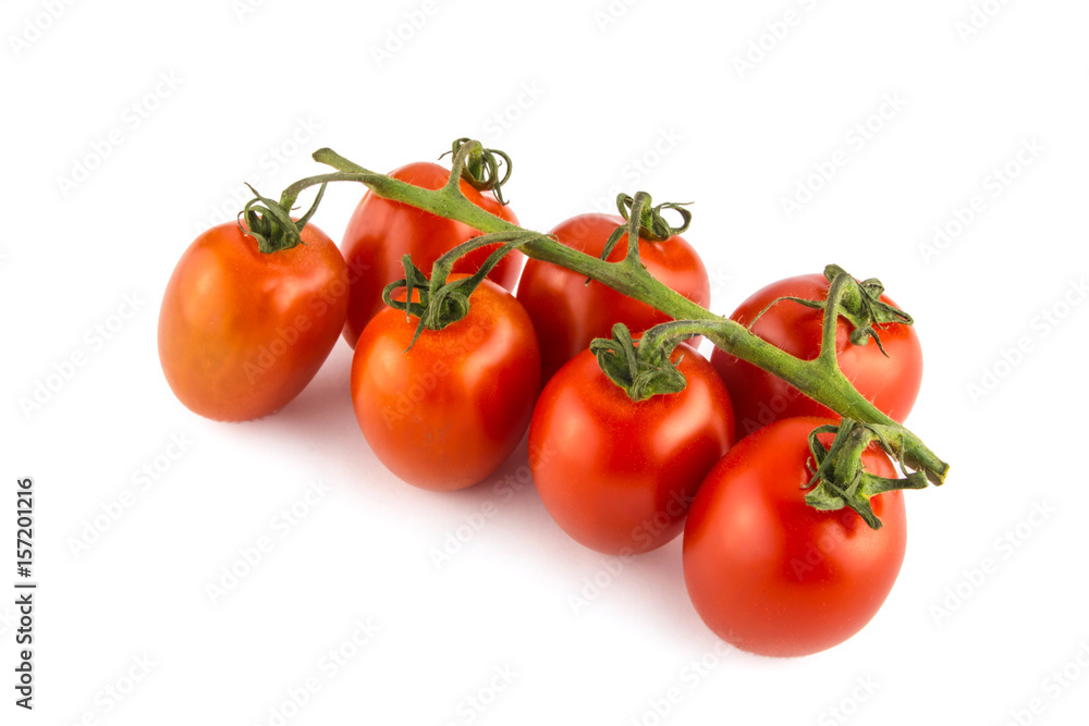 Cherry tomatoes isolated over white background close. Cherry tomatoes isolated over white background close.