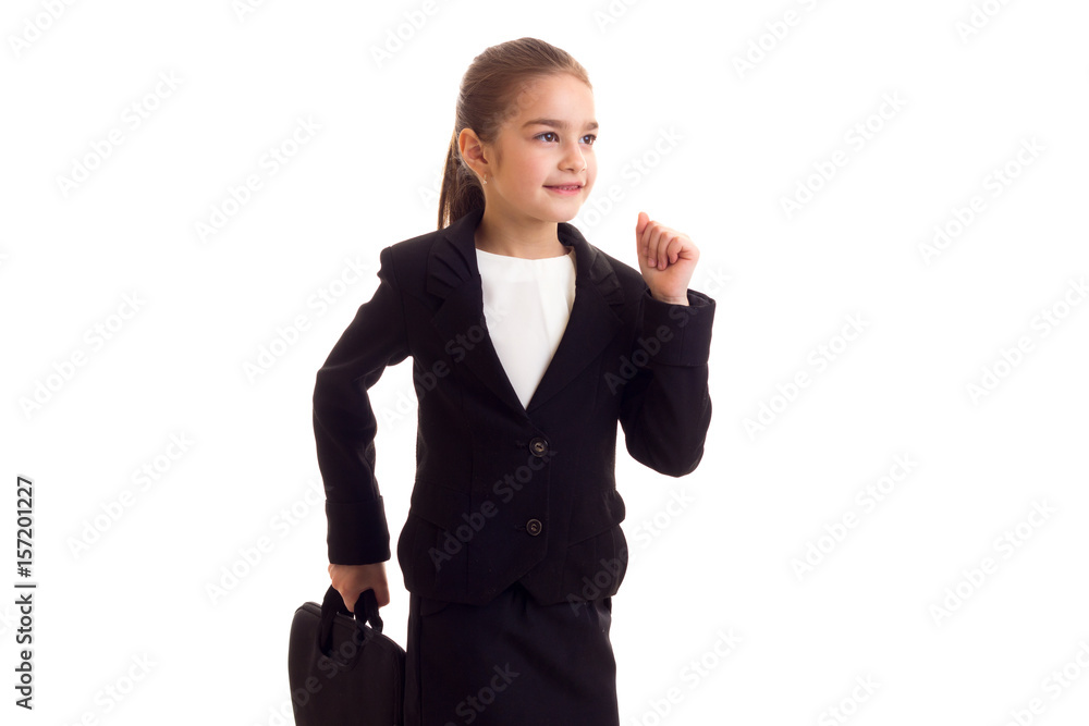 Little girl in black jacket holding diplomat Little girl in black jacket holding diplomat