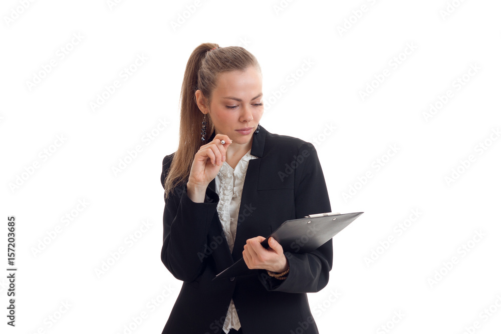 young beautiful girl wearing a business looks at Tablet young beautiful girl wearing a business looks at Tablet