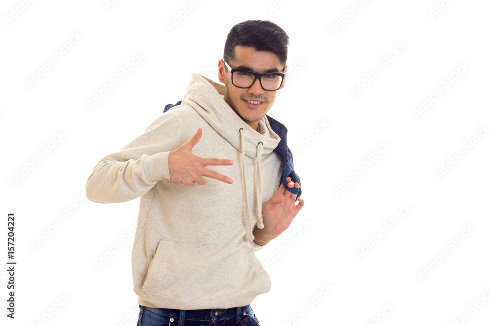 Young man with glasses and backpack Young man with glasses and backpack