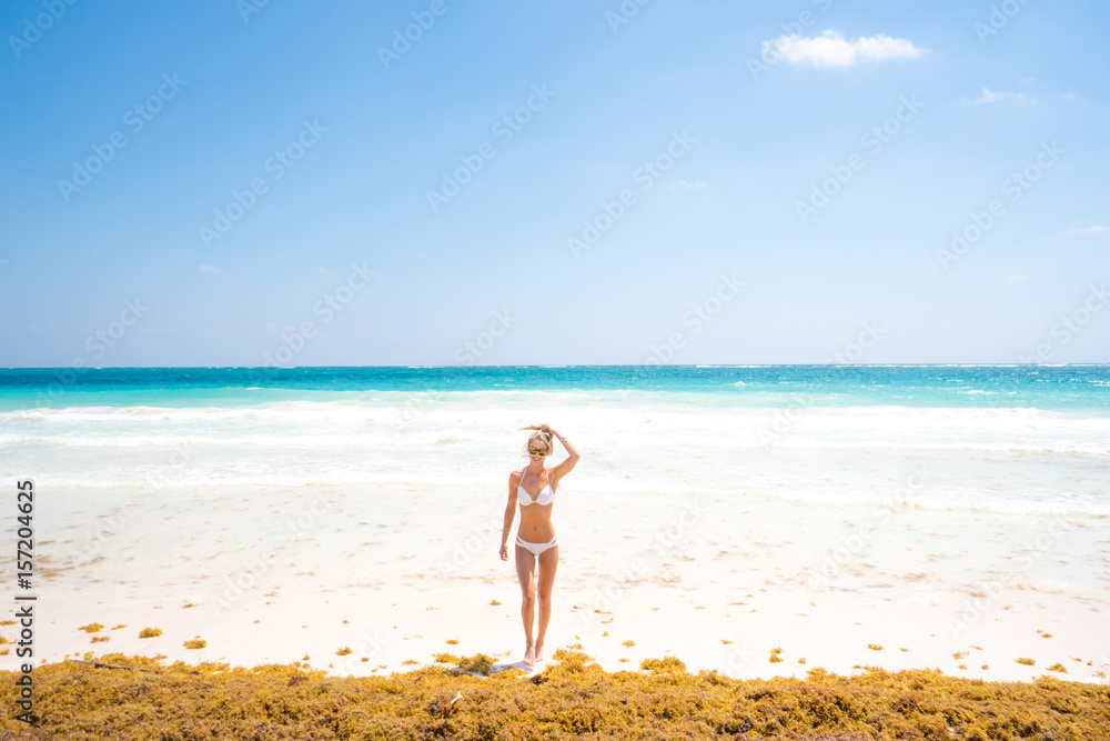 Woman on the beach in Caribbean Woman on the beach in Caribbean
