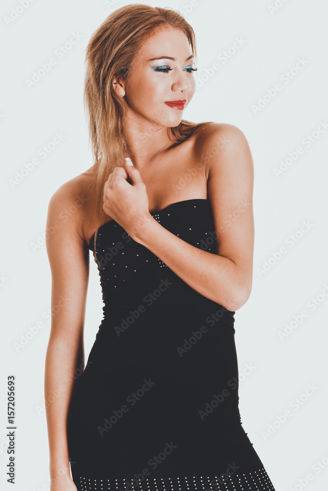 Fototapeta premium Young woman wearing party dress.