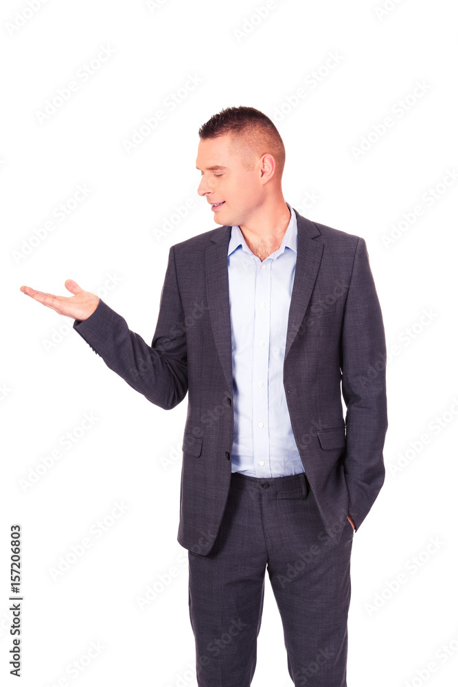 Smiling businessman holding copyspace Smiling businessman holding copyspace