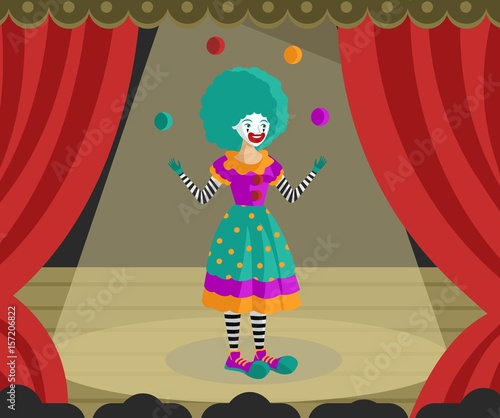 female clown juggler with balls on theater stage