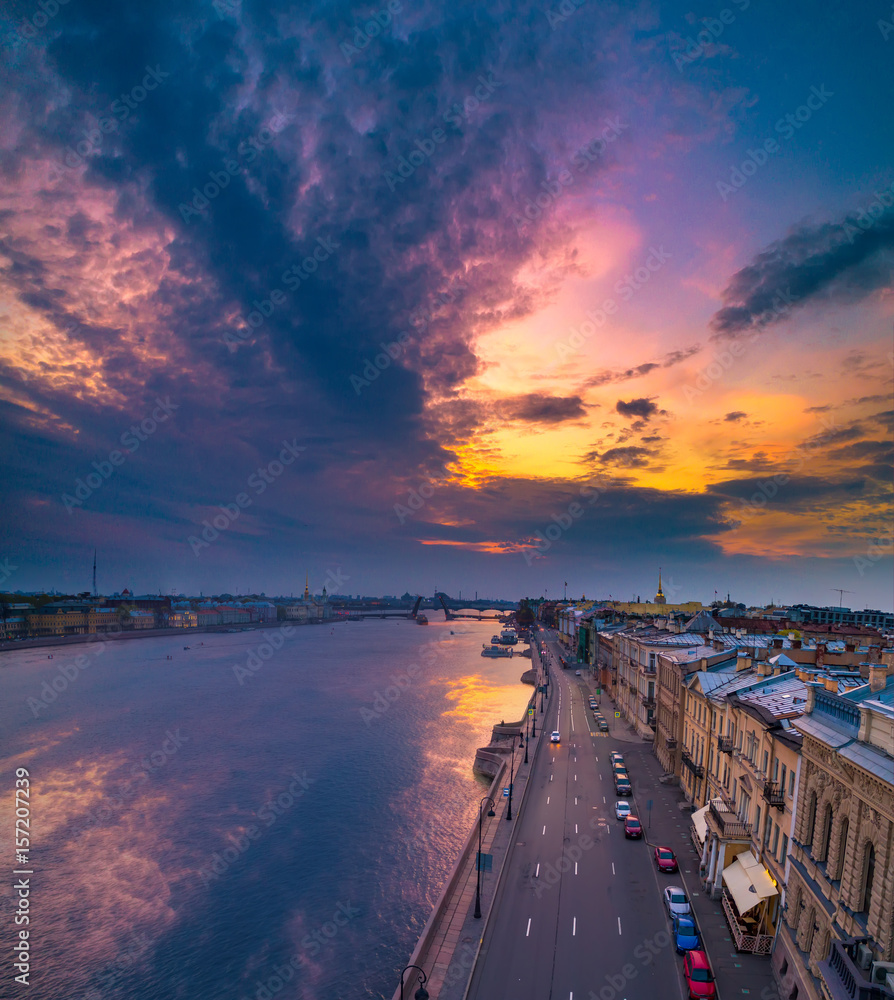 Dawn of the sun over the Neva. Morning St. Petersburg. The British Embankment.