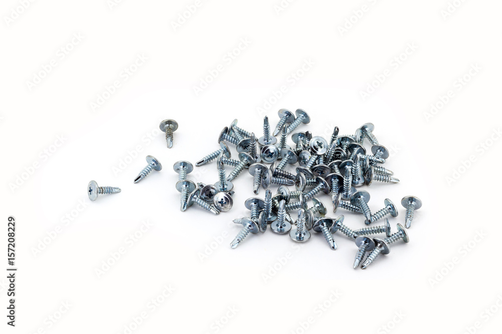 Pile of galvanized screws isolated on the white background Pile of galvanized screws isolated on the white background