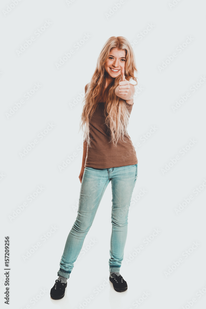 Student woman showing thumb up