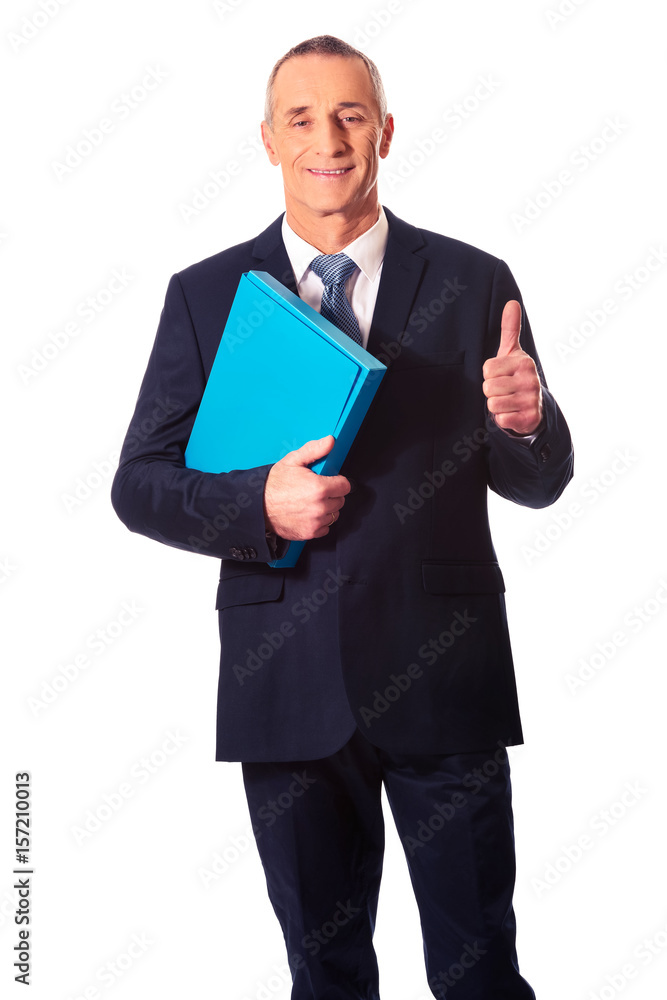 Businessman with ok sign holding a binder Businessman with ok sign holding a binder