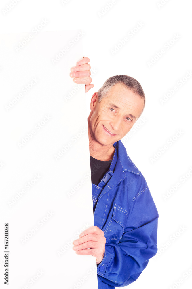 Happy worker presenting empty banner