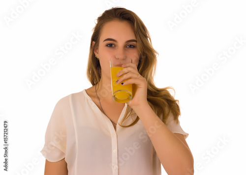 Young pretty girl, orange juice, white background 