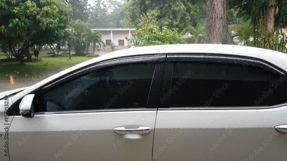 rain drop on the white car rain drop on the white car