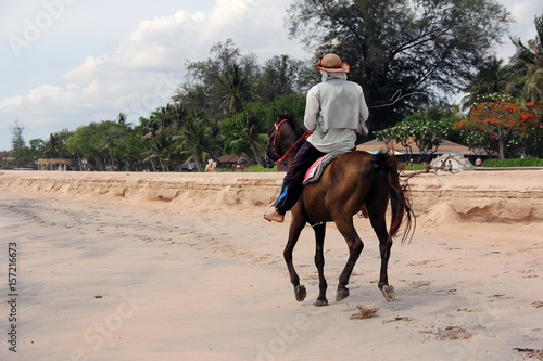 Horse rider / A man riding horse, Hua Hin beach, Thailand