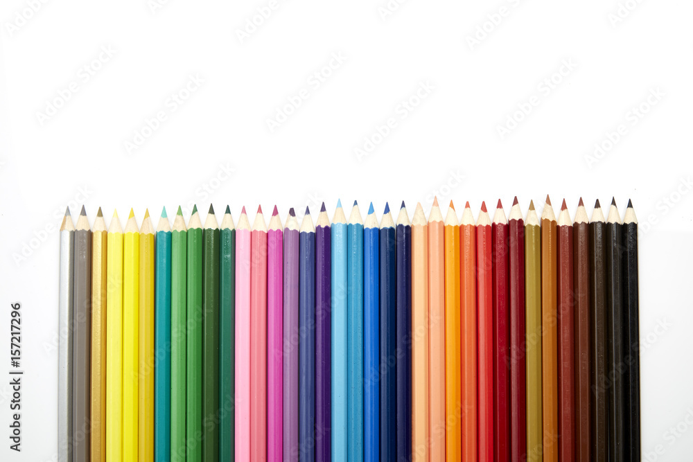 Many different colored pencils on white background Many different colored pencils on white background