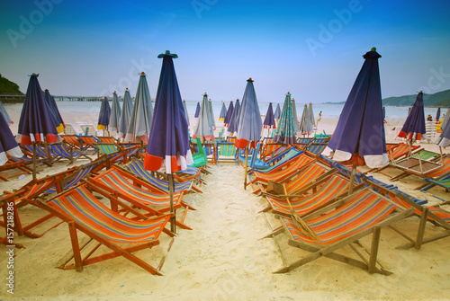 Beach beds on the beach with Big umbrella and blue sky © njmucc