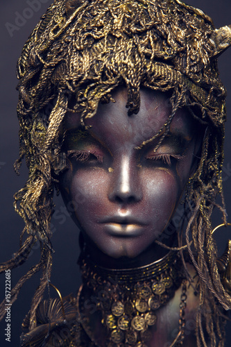 Female Mannequin in metal headwear © EVGENY FREEONE