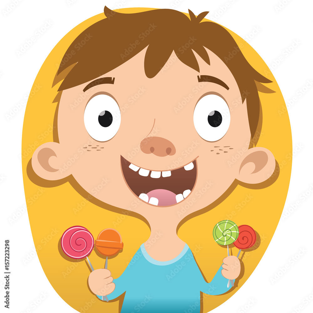 smiling boy holding candy. smiling boy holding candy.