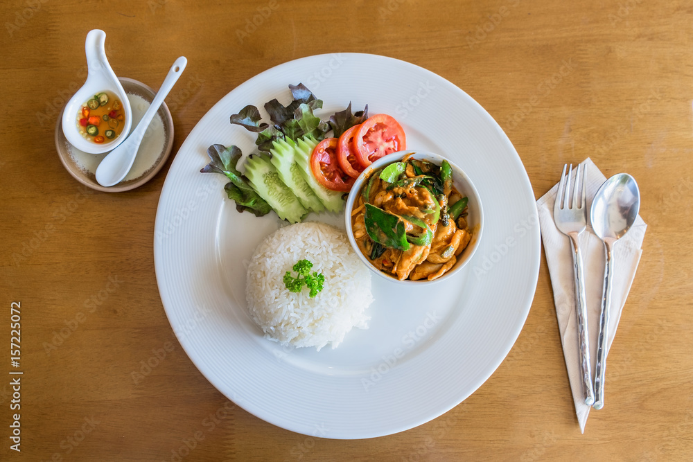 Thai Chicken Curry with Vegetables on wood background Thai Chicken Curry with Vegetables on wood background