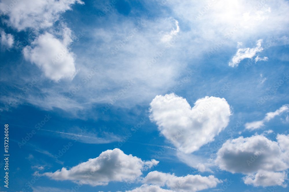 heart cloud on blue sky background. weather or love abstract symbol with  space for text Stock Photo | Adobe Stock