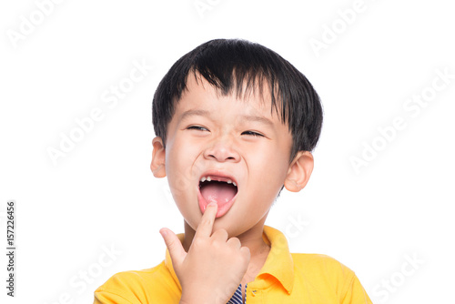 Lost milk tooth asian boy, Close up view.