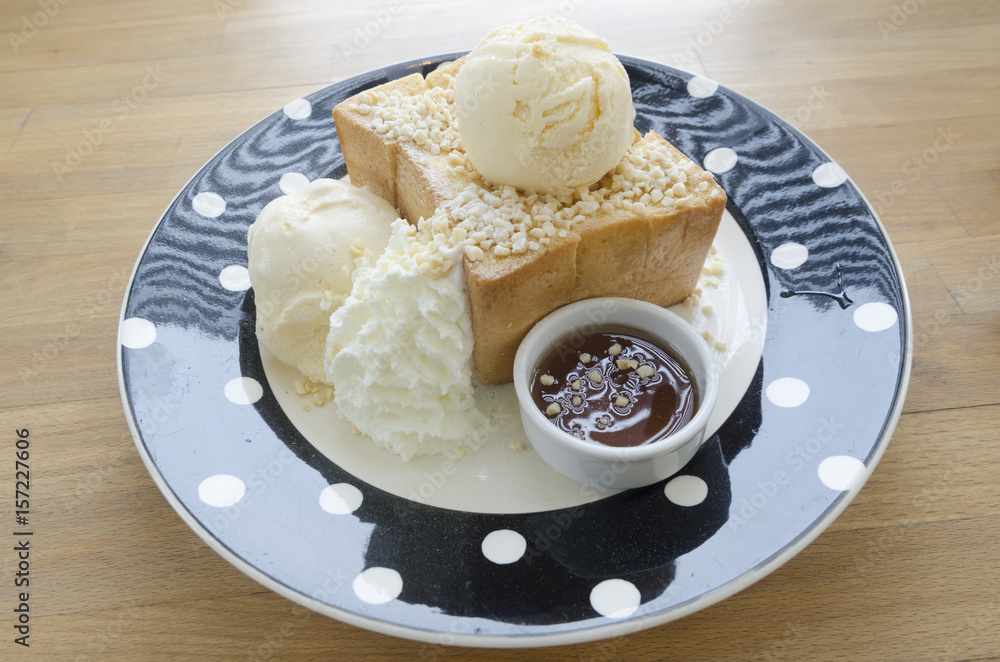 Honey Toast, Consists of bread topped with honey and ice cream Honey Toast, Consists of bread topped with honey and ice cream