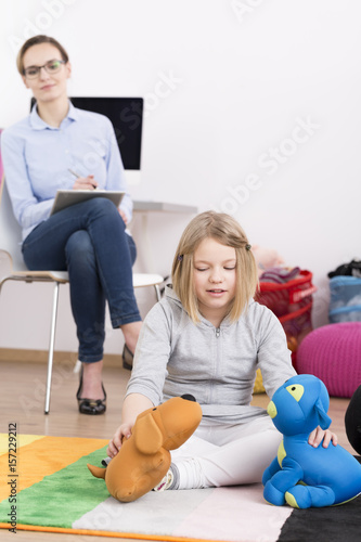 Therapist observing how child interacts