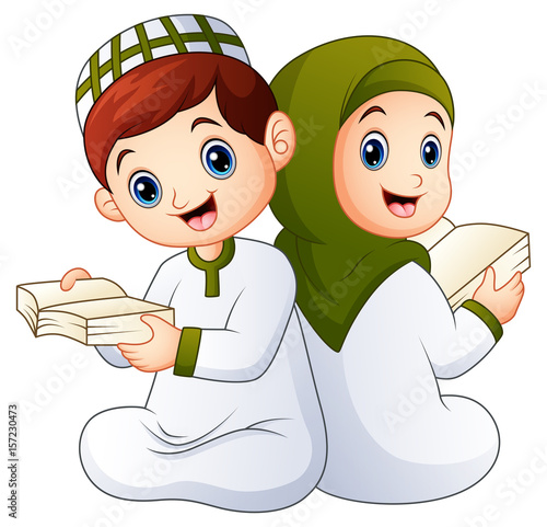 Happy muslim kid holding quran 