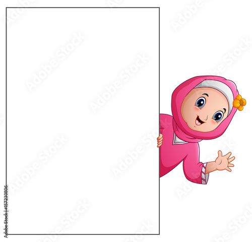 Happy muslim girl cartoon holding blank sign 