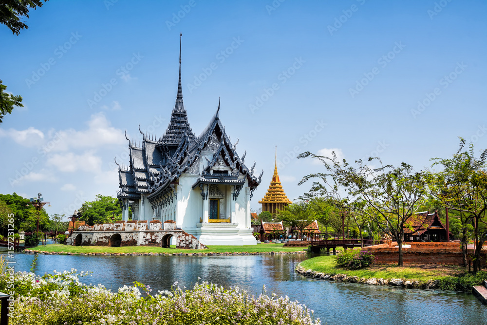 Naklejka premium Amazing view of beautiful Sanphet Prasat Palace with reflection in the water. Location: Ancient City Park, Muang Boran, Samut Prakan province, Bangkok, Thailand. Artistic picture. Beauty world.