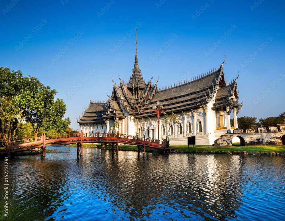 Amazing view of beautiful Sanphet Prasat Palace with reflection in the water. Location: Ancient City Park, Muang Boran, Samut Prakan province,  Bangkok, Thailand. Artistic picture. Beauty world.