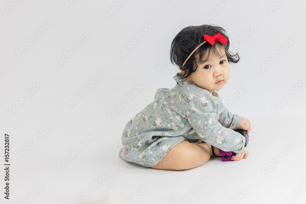 10-month-old Asian girl smiled happily.Healthy children are happy.
10-month-old Asian girl smiled happily.Healthy children are happy.