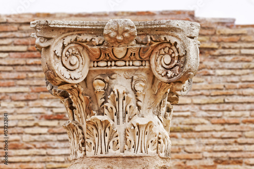 Ancient Roman capital close up in Ostia Antica - Rome - Italy