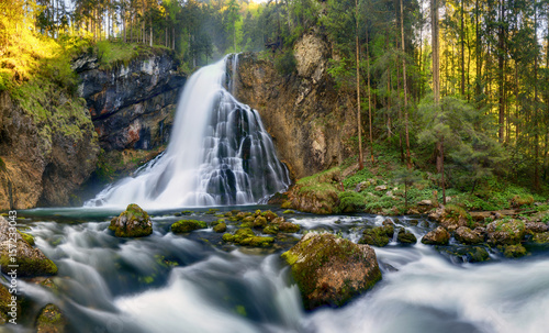 Fototapeta Naklejka Na Ścianę i Meble -  Waterfall with mossy rocks in Golling, Austria