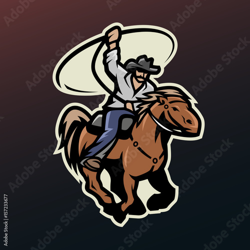Cowboy with a lasso on a horse.