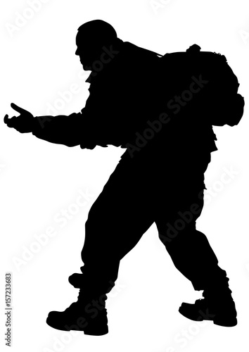 Soldier in uniform with weapon on white background