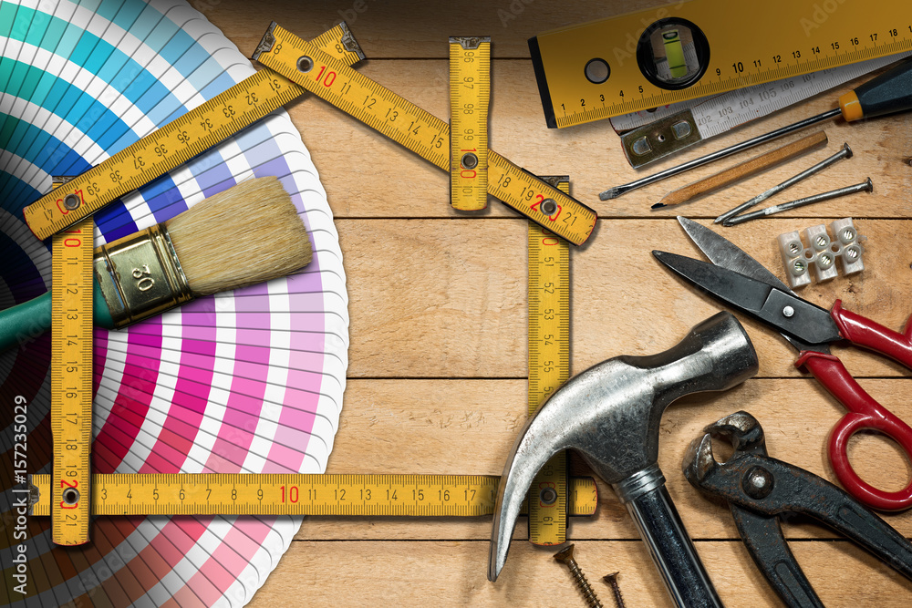 Home Improvement Concept - Work Tools and House Home Improvement Concept - Work Tools and House