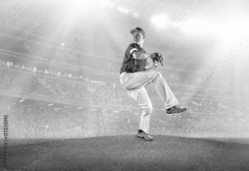 Baseball players in action on the stadium. © Andrii IURLOV