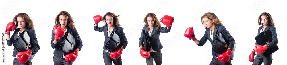 Young woman with boxing gloves isolated on white Young woman with boxing gloves isolated on white