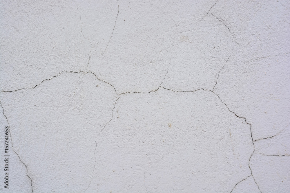 Obraz premium Close up cracked cement plaster texture background