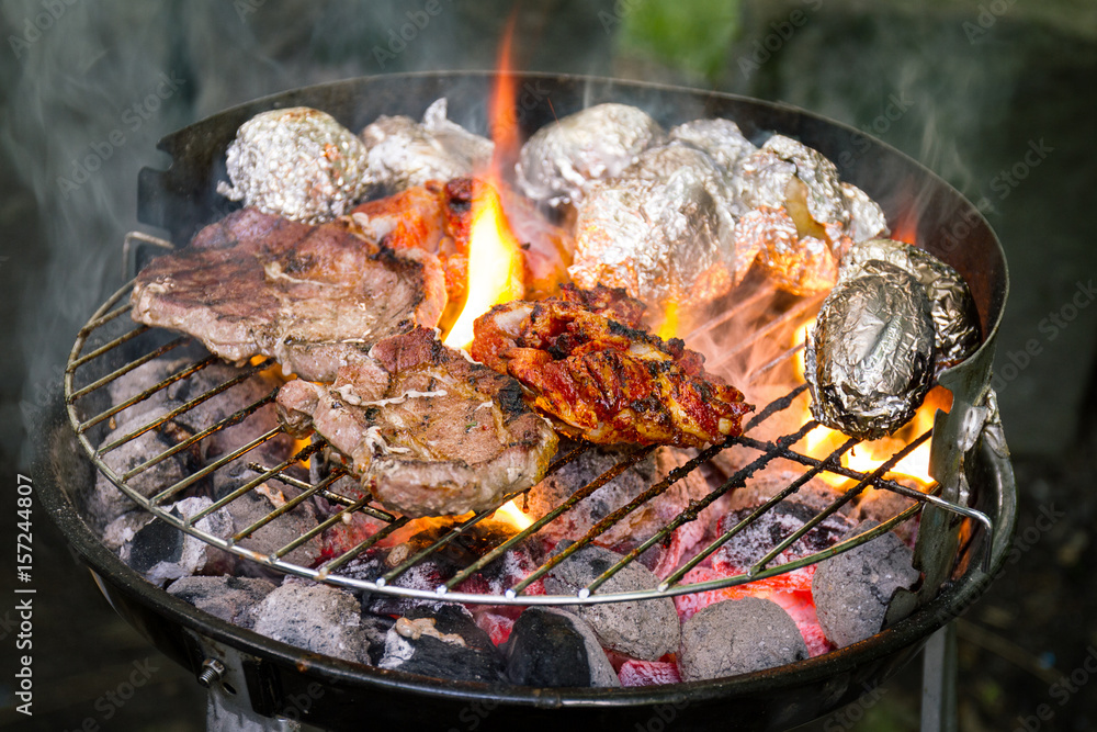 How to grill meat over an open fire